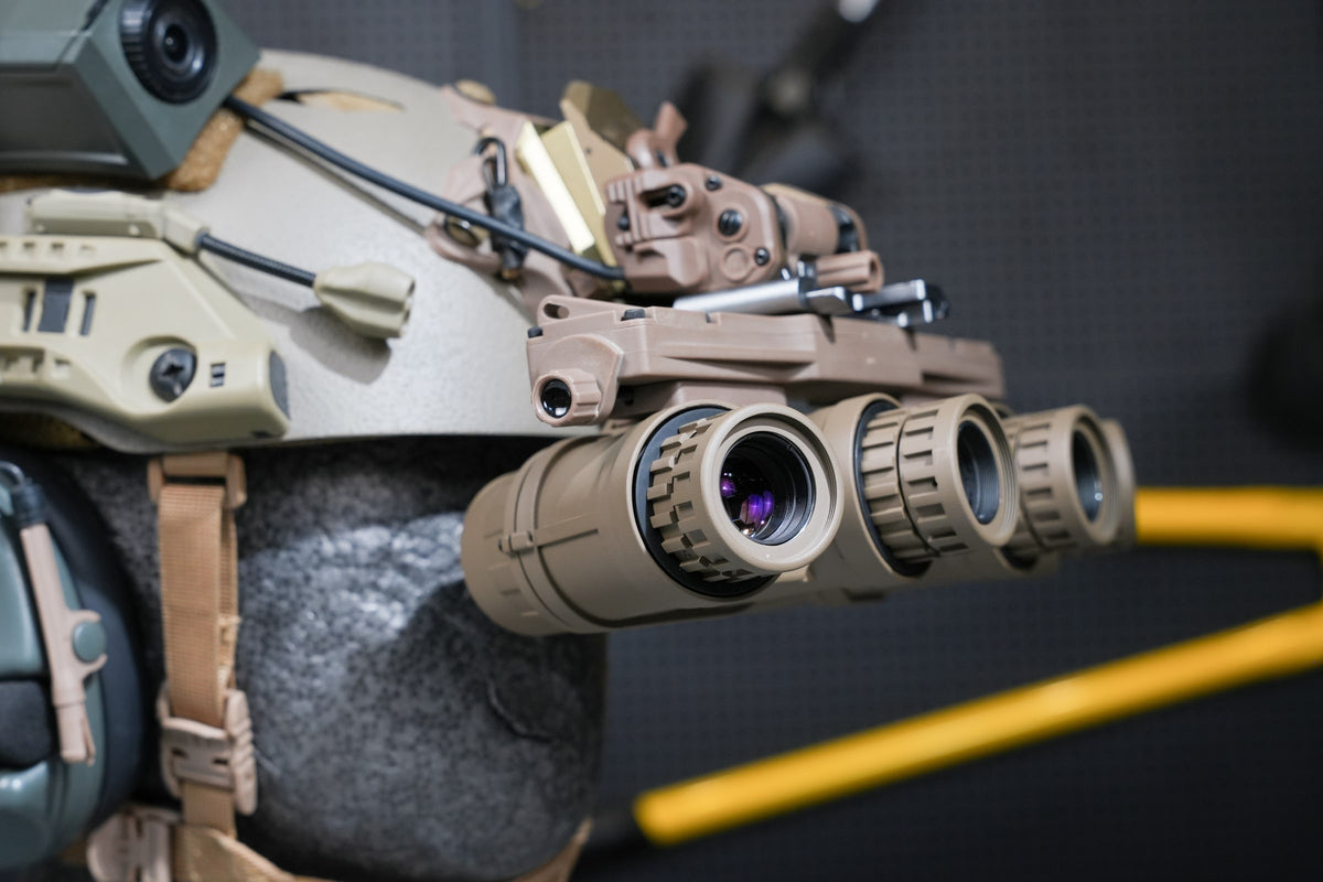 Tan Kaelor KPNVG-18 ANVIS panoramic NVG mounted on a helmet, side view