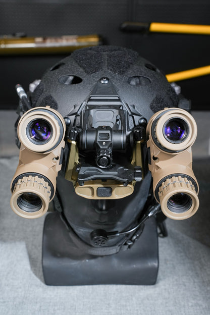 Kaelor KPNVG-18 with both optical pods folded beside a display helmet, front view