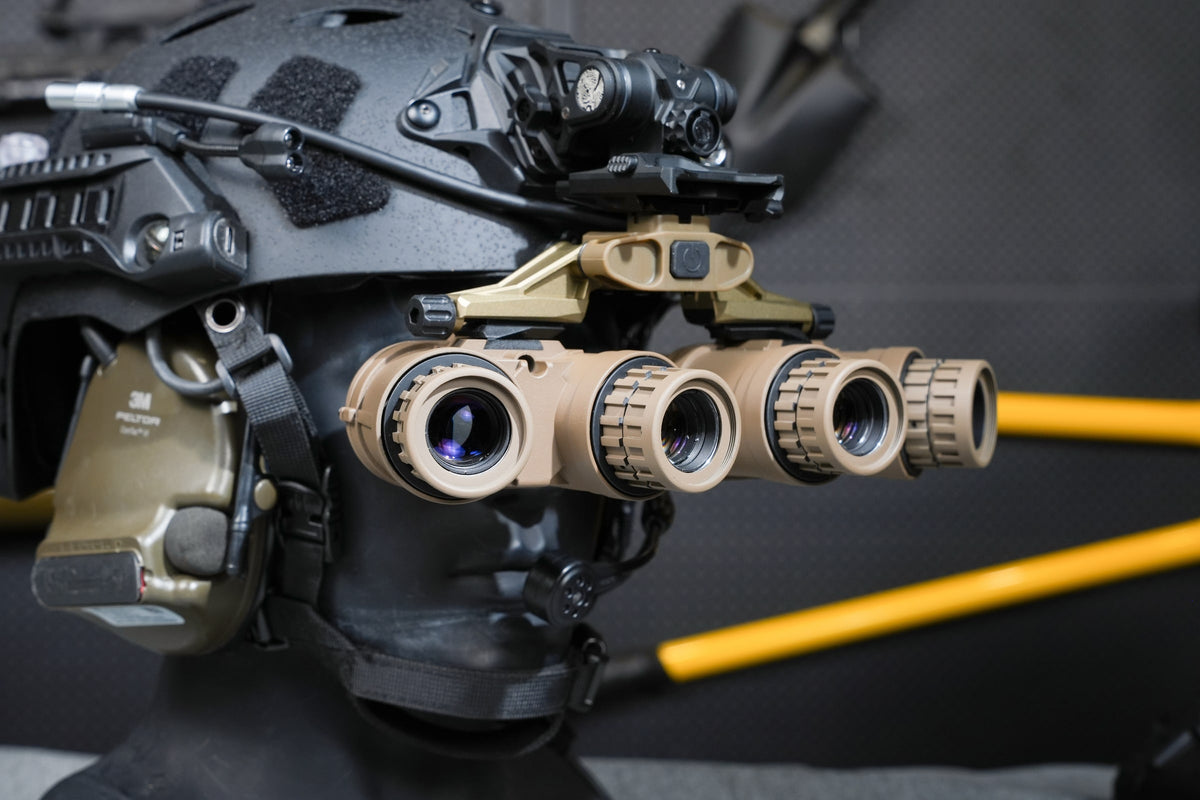 Tan Kaelor KPNVG-18 articulating panoramic night vision mounted on a display helmet, angled view