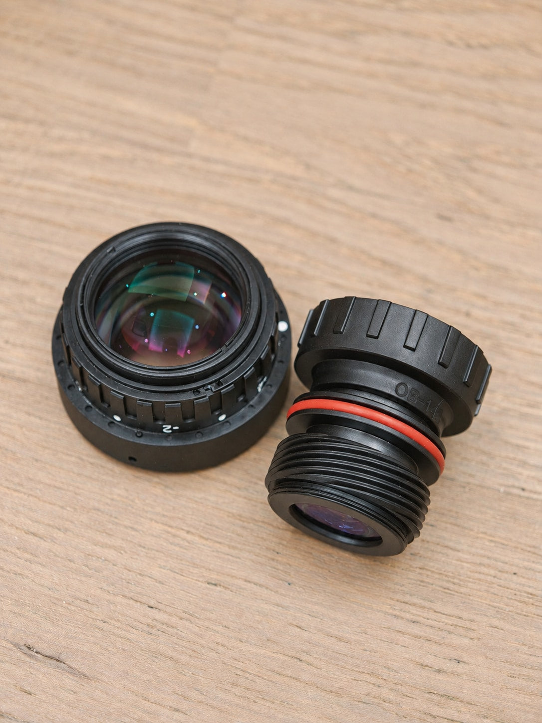 Norinco LW40 PVS-14 lens set showing objective threads and eyepiece