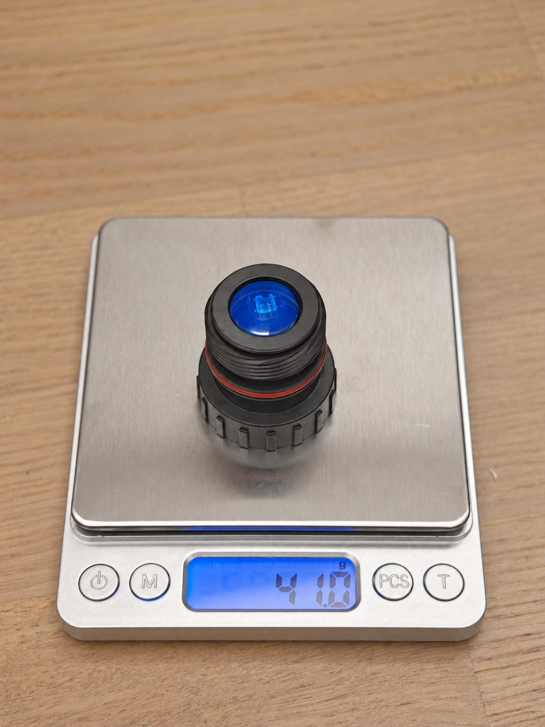 Norinco LW40 objective sample on scale displaying 41.0 g