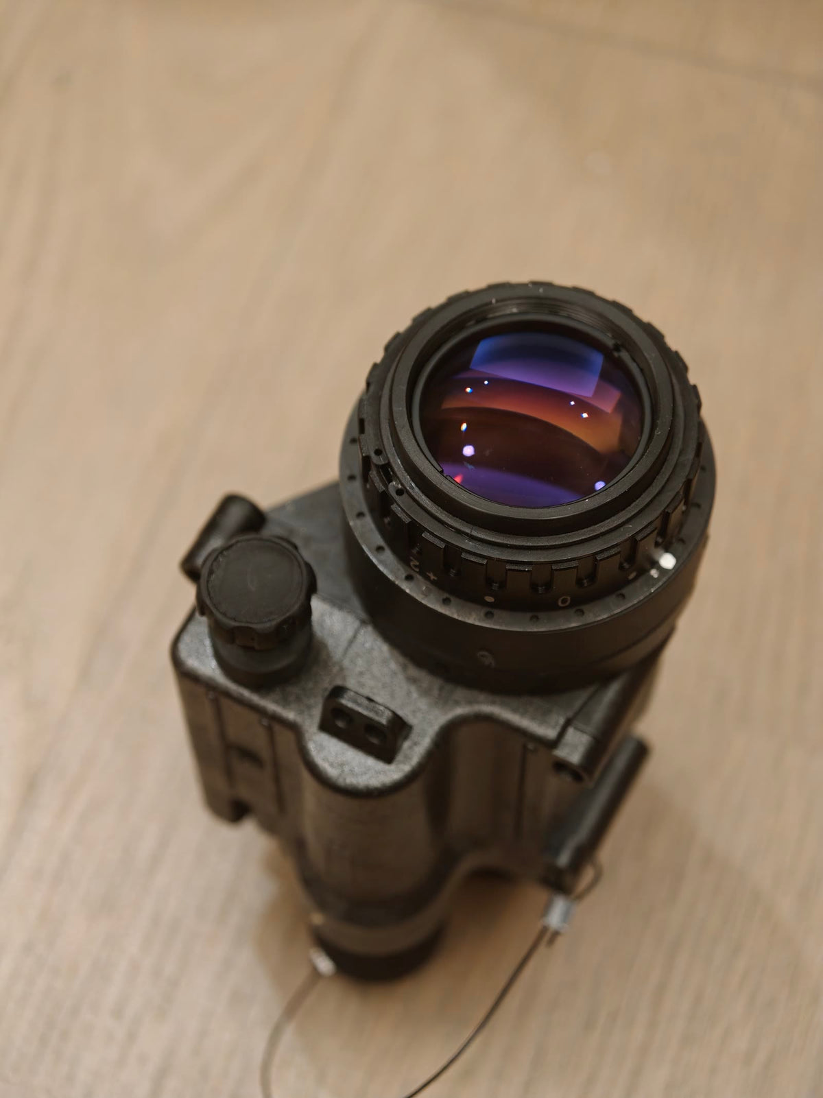 Reference photo of the PVS-14 eyepiece and housing.