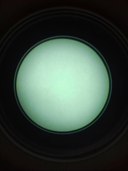 Reference image of a white-phosphor tube screen; actual unit appearance and FOM vary.